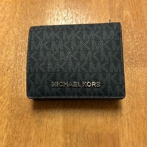 Michael Kora wallet